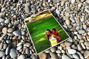 photo of people on a pebble beach