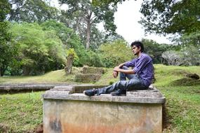 young man in jeans in sri lanka