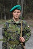 soldier in a green cap
