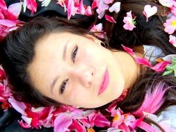 girl portrait in colorful petals