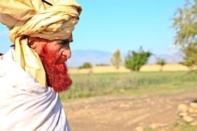 old man with turban and red beard