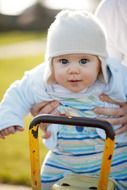 small baby on the swing