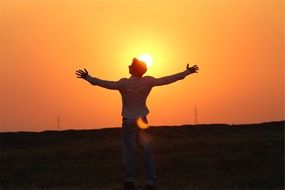 guy silhouette at sunset