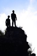 silhouette of boys sky tall rock ceylon