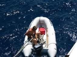 man in a boat in the ocean