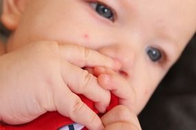 Photo of small baby with blue eyes