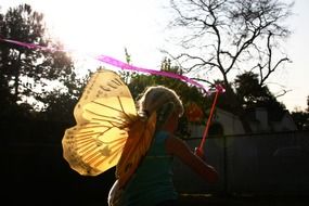 sun girl play butterfly silhouette