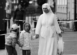 Black and white photo of the nun with the children