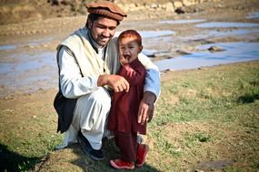 father with child in afghanistan