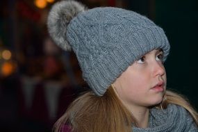 View of the girl in grey hat