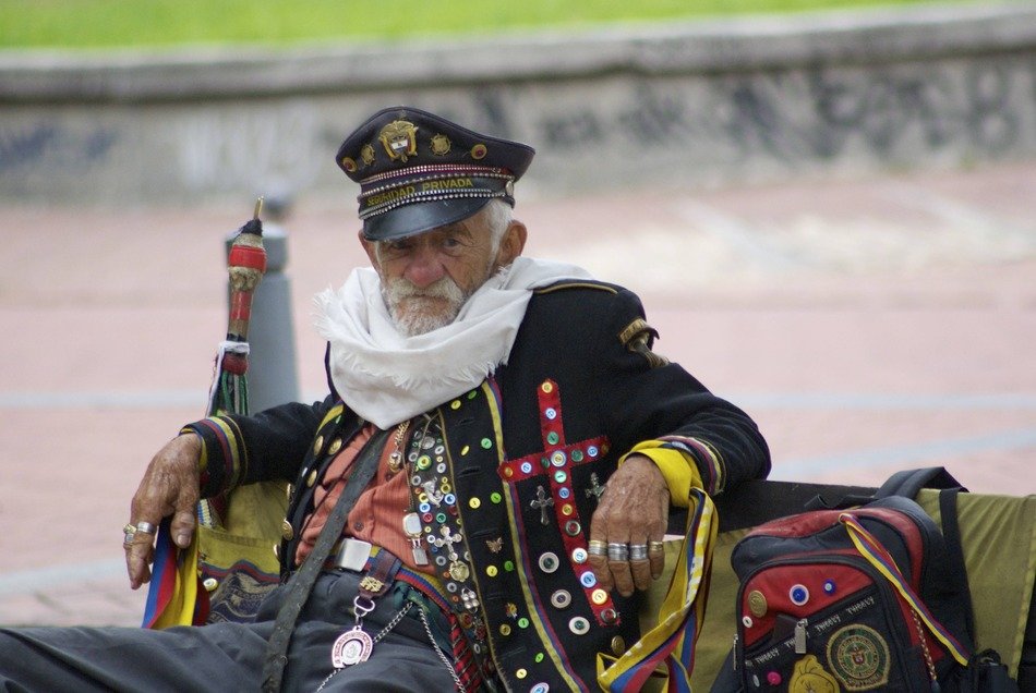 old man in a costume of general in bogota on a blurred background