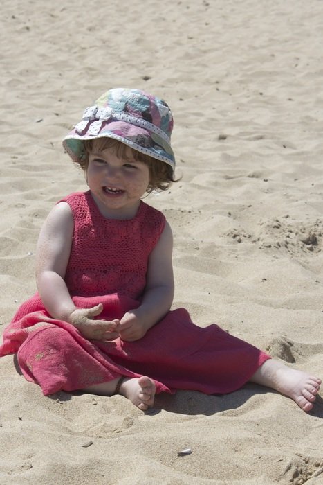 Baby on the beach in summer