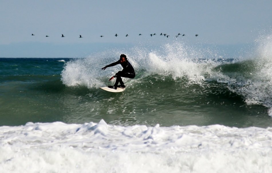 surfer riding on wave