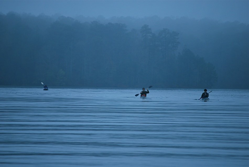 Rowing in the blue water in the summer