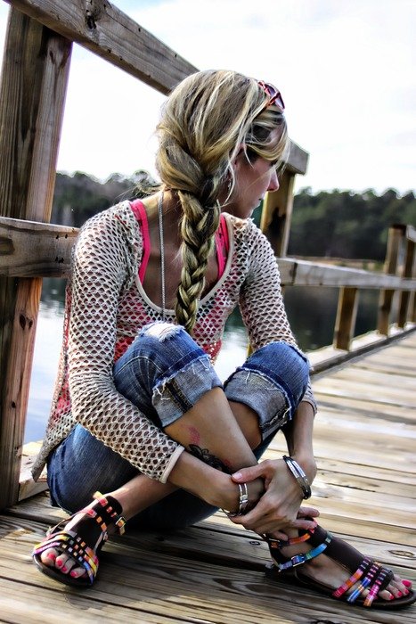 Portrait of the sitting blonde girl