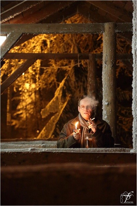 lonely old smoker at dusk
