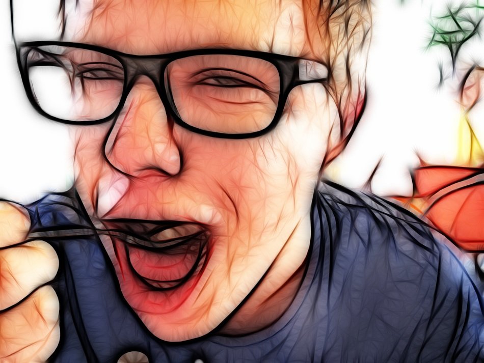 man's face with glasses who eating ice cream spoon