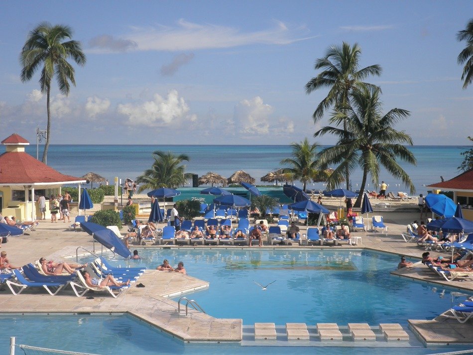 sunbeds near the pool in the resort