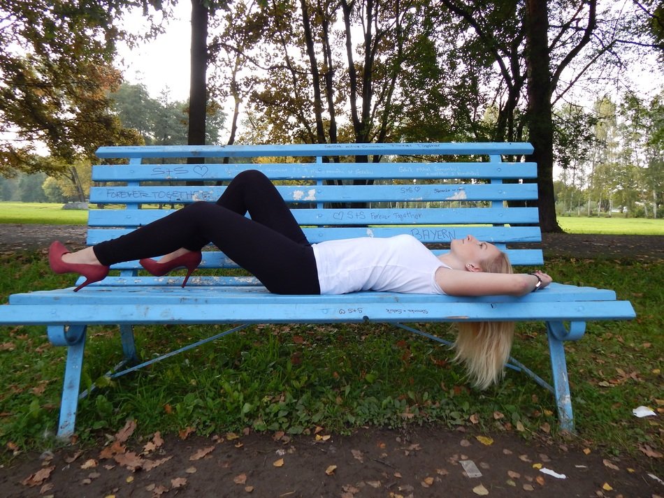 Sexy Girl Lays Down On Bench In Park Free Image Download