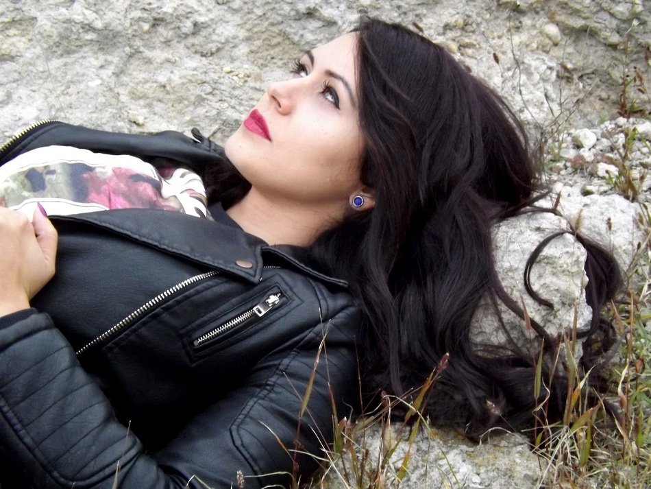 portrait of beautiful girl on a ground