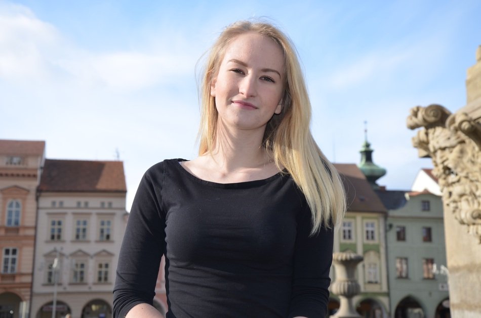 blonde is looking at the camera