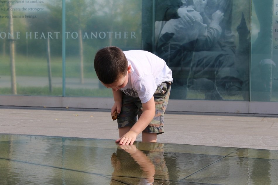 boy at the memorial