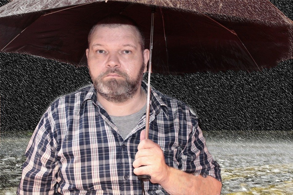the man under the umbrella