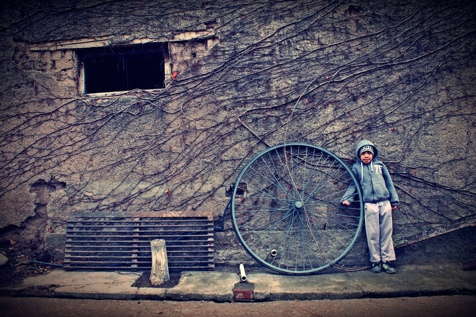 child with big wheel