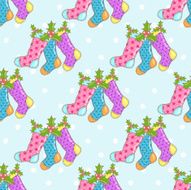 Christmas seamless background with socks on a blue