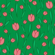 red tulips on a green background