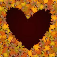 Background heart made of autumn leaves