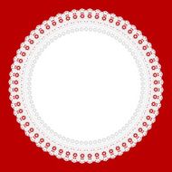 White round openwork napkin on red background