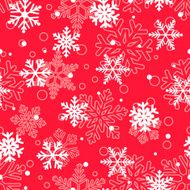 Seamless pattern of snowflakes white on red