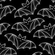 Seamless pattern with dotted bats in white