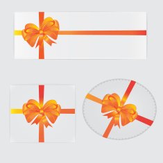 Orange bows ribbons and gifts