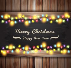 Christmas lights on wooden boards and chalkboard
