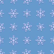 Seamless pattern of snowflakes on a blue background