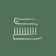 Toothbrush with toothpaste icon drawn in chalk