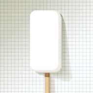 Ice lolly big milk on a checkered pattern background