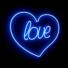 Neon heart with inscription LOVE on a black background