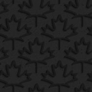 Black textured plastic maple leaves countered