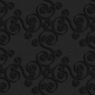 Black textured plastic diagonal spiral flourish