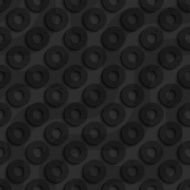 Black textured plastic diagonal donuts with waves