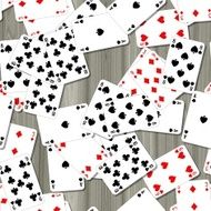 Abstract background with playing cards on the grey wooden table