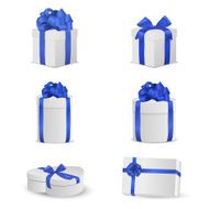 Set of white gift boxes with blue bows and ribbons