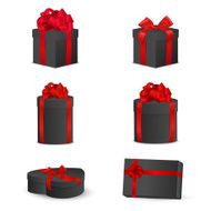 Set of black gift boxes with red bows and ribbons