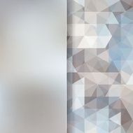 abstract background consisting of gray triangles and matt glass