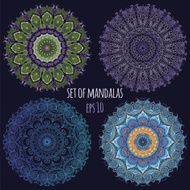 Set of vector color Mandala on the dark background