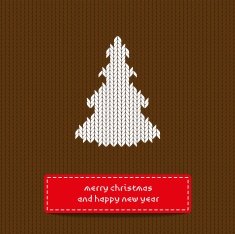 Christmas tree on brown knitting background