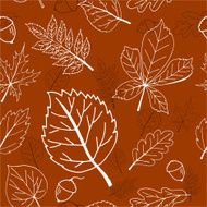 Seamless brown pattern with autumn leaves and acorns